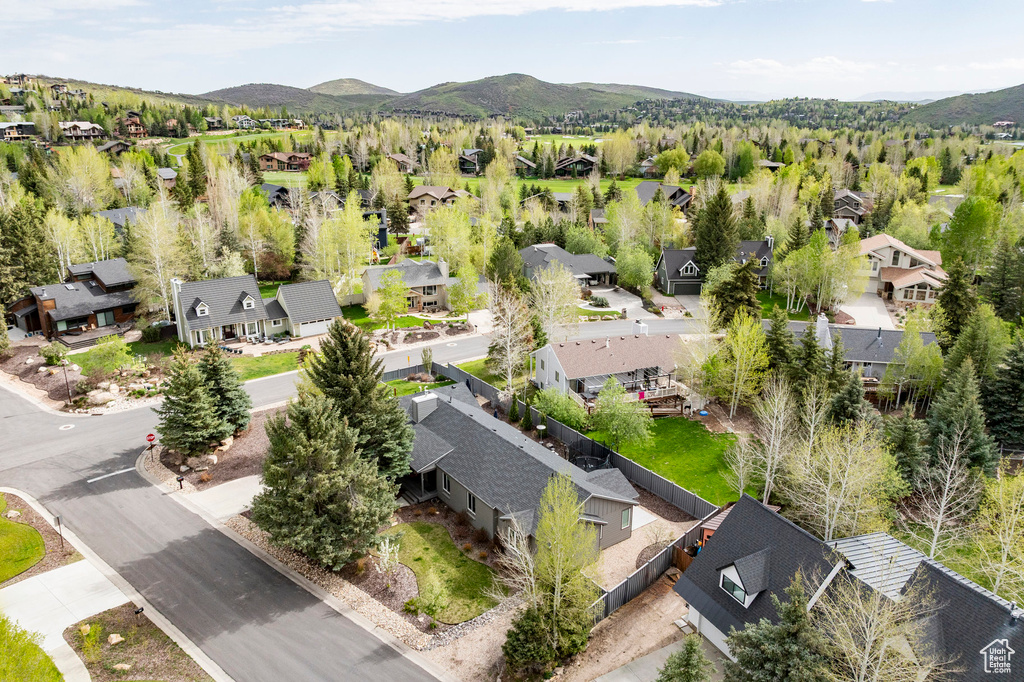 Aerial view of residential area with a mountainous background