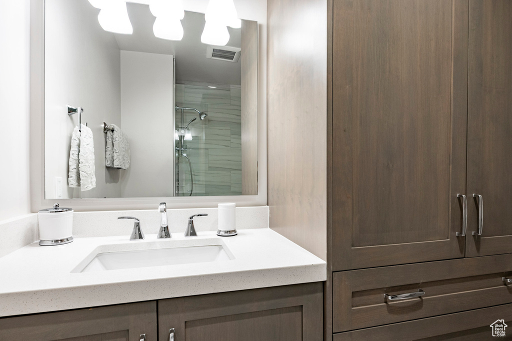 Bathroom with a shower and vanity