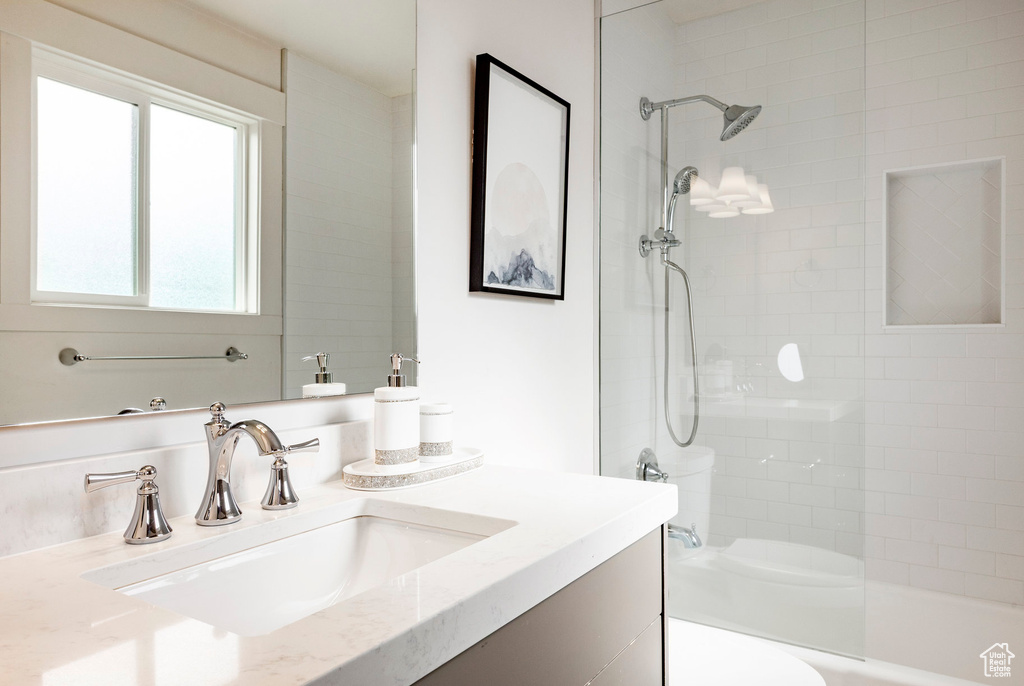 Bathroom featuring vanity and toilet