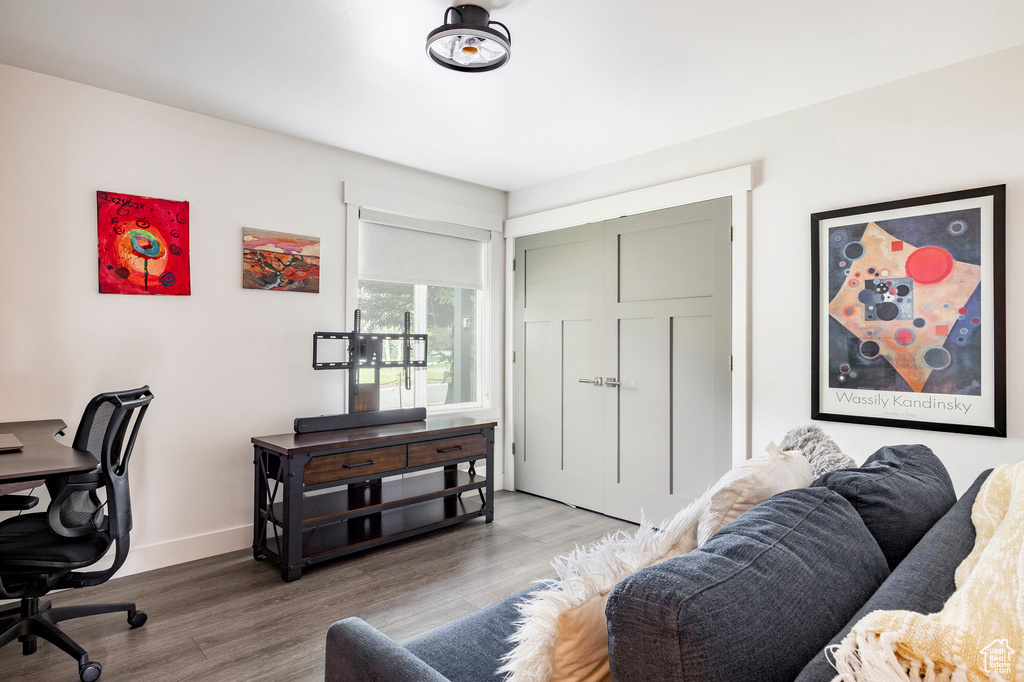 Office space featuring wood finished floors and baseboards