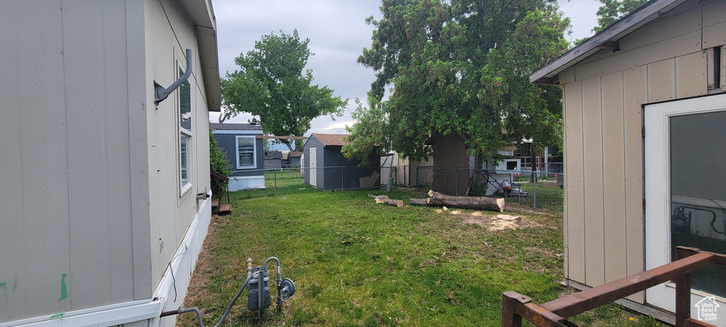 View of yard with fence