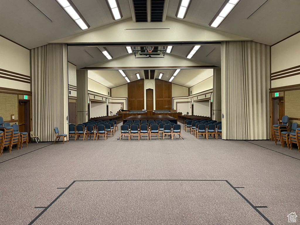 Common area featuring high vaulted ceiling