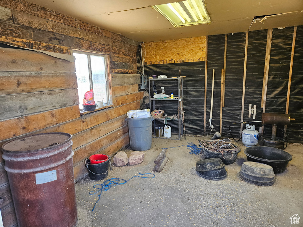 Miscellaneous room with wooden walls