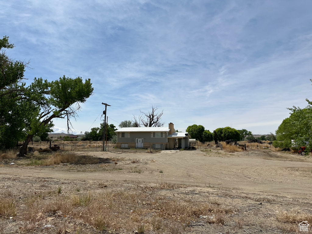 View of yard featuring central air condition unit and a view of rural / pastoral area