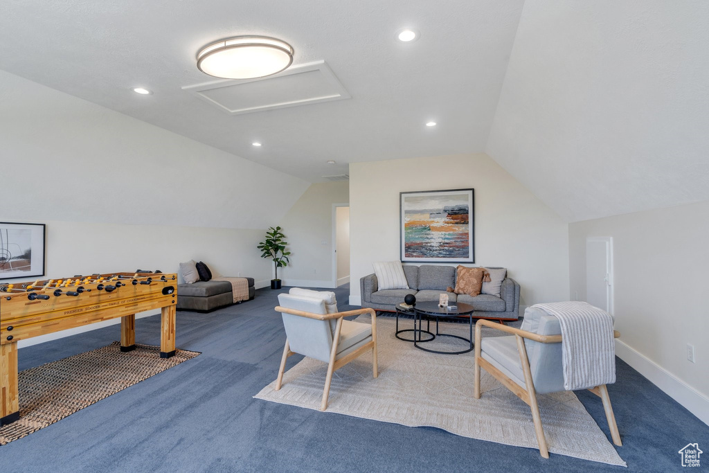 Rec room featuring attic access, carpet floors, vaulted ceiling, baseboards, and recessed lighting