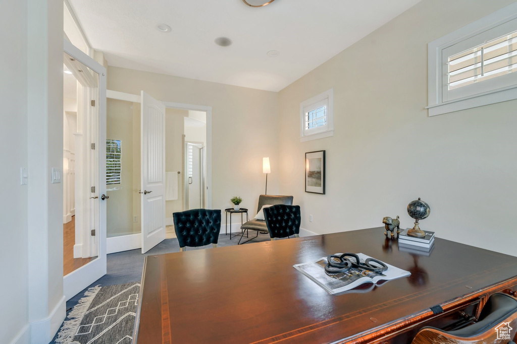 Office with baseboards and dark wood finished floors