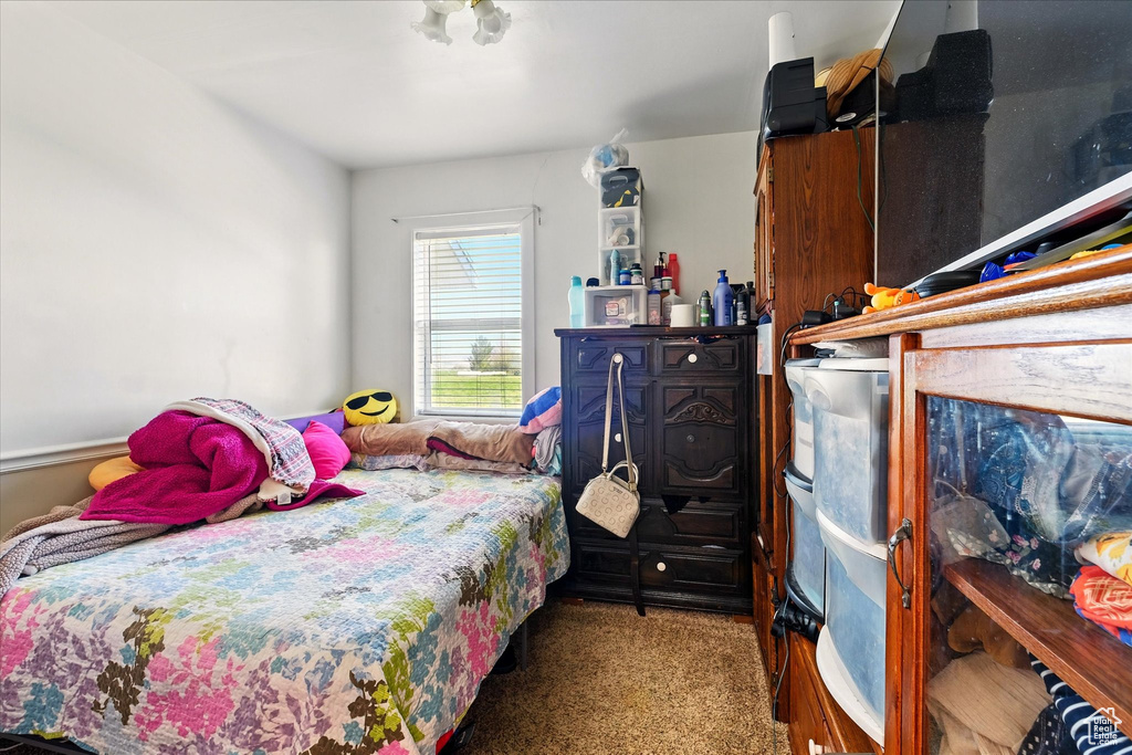 Bedroom featuring carpet flooring
