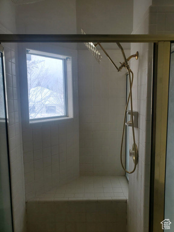 Bathroom with a tile shower