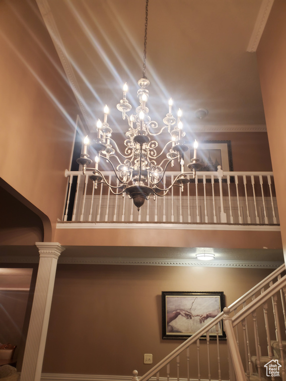 Detailed view of decorative columns and a chandelier