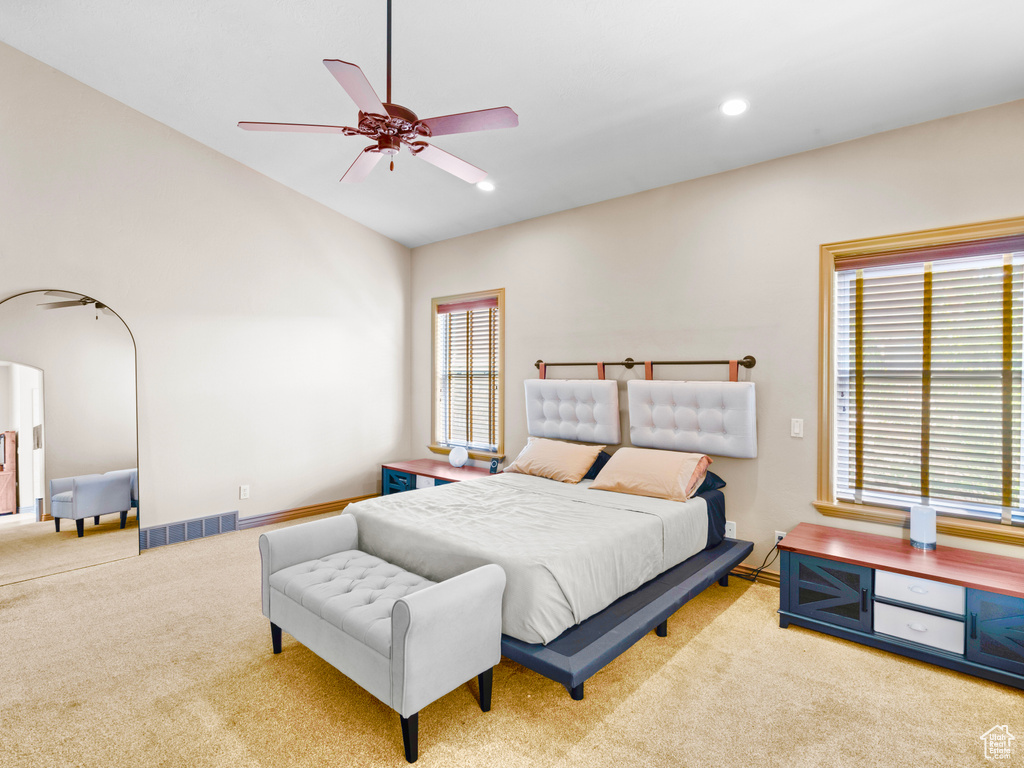 Bedroom featuring carpet flooring, lofted ceiling, a ceiling fan, and recessed lighting
