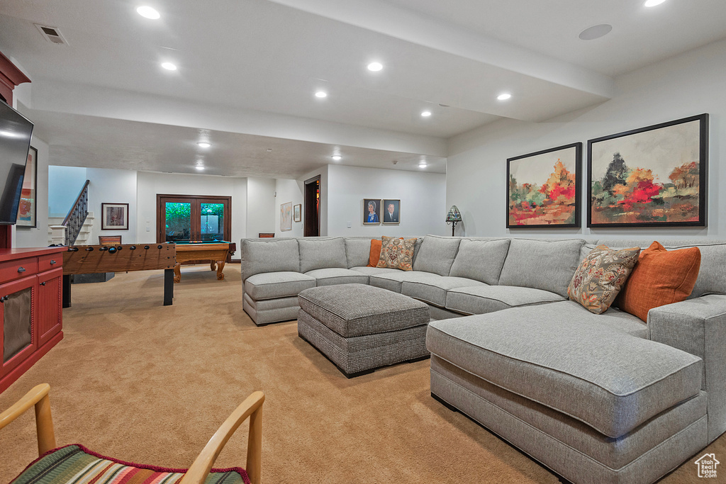 Living area with light carpet, billiards table, and recessed lighting