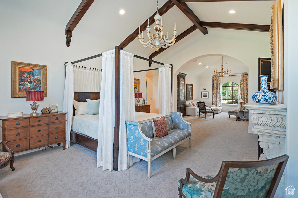 Bedroom with a chandelier, arched walkways, beam ceiling, recessed lighting, and carpet