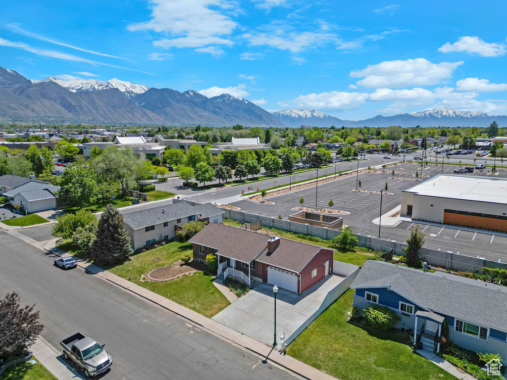 Aerial view of residential area with a mountain backdrop