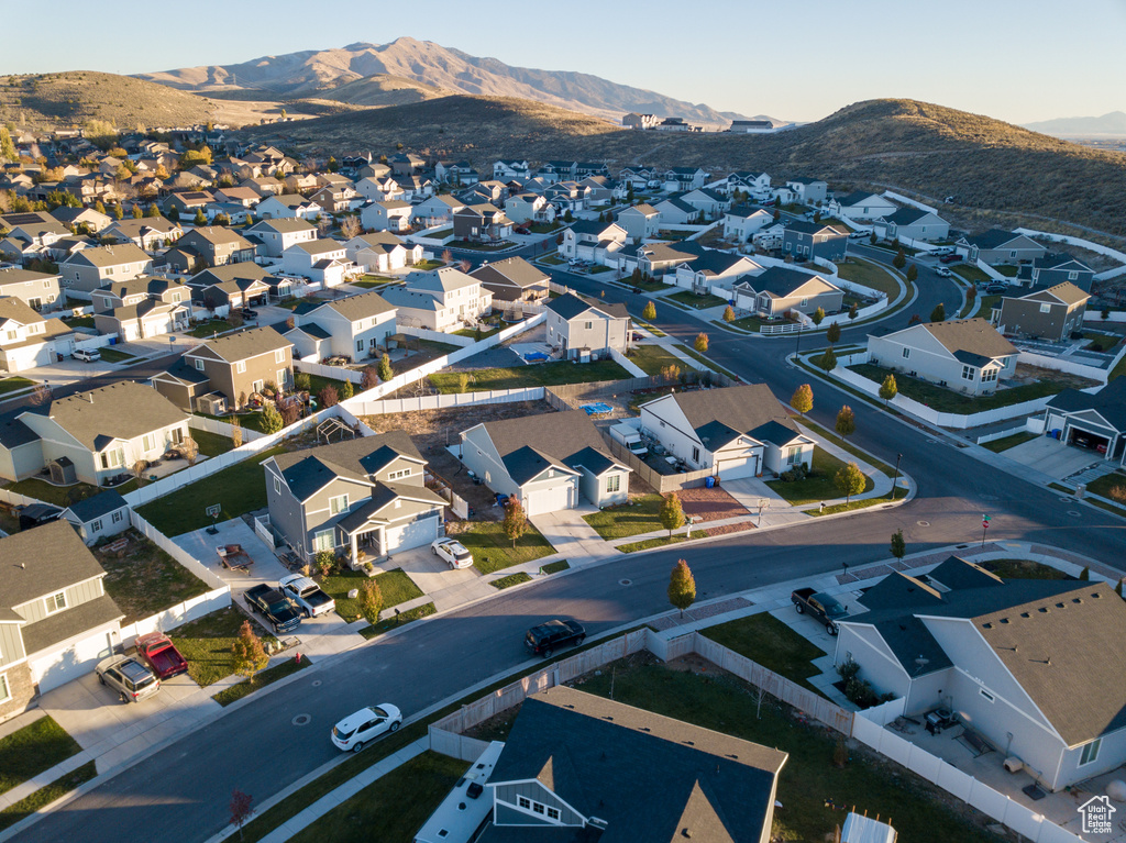 Aerial perspective of suburban area with mountains