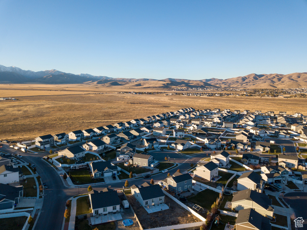 Aerial perspective of suburban area featuring mountains