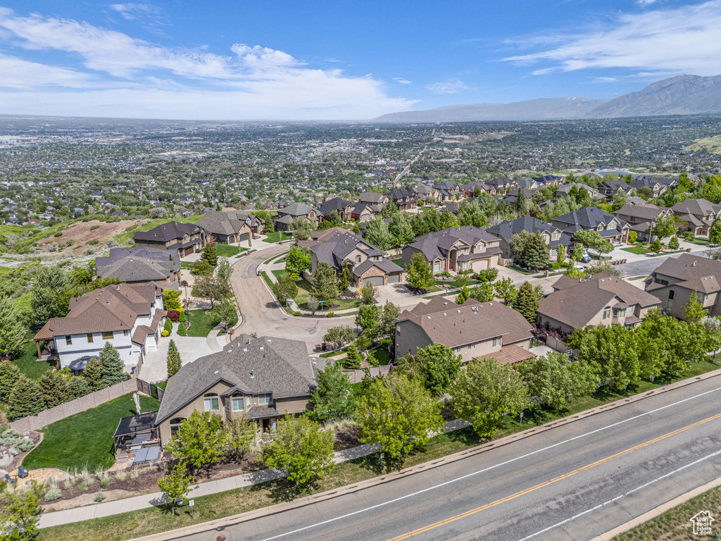 Aerial view of residential area with a mountain backdrop