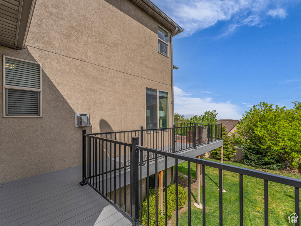 Wooden deck with a yard