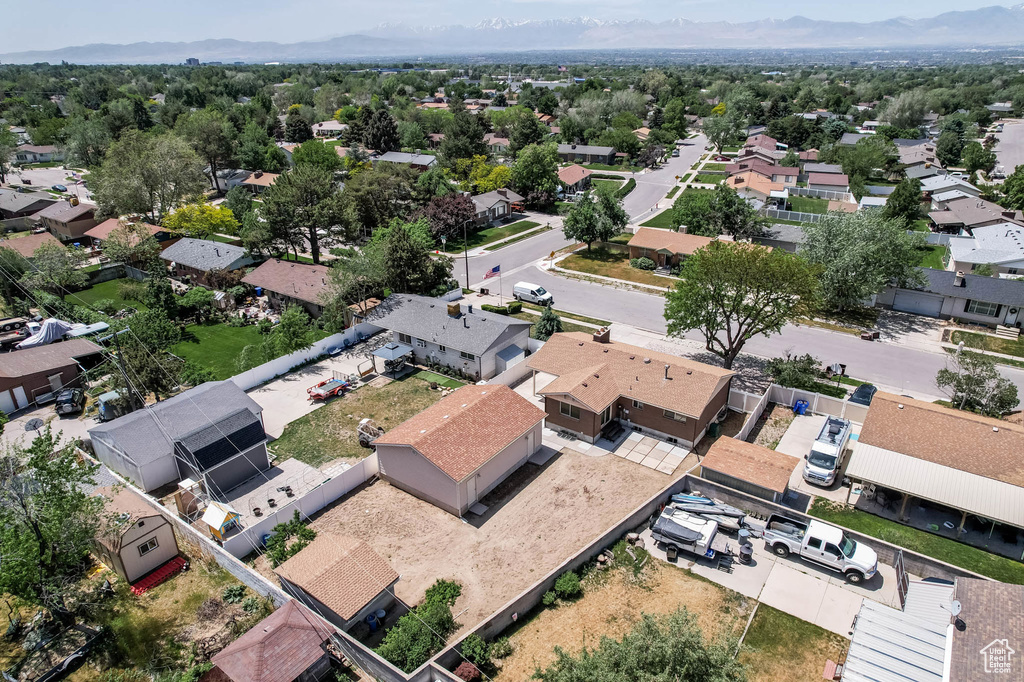 Aerial view of residential area with a mountain backdrop