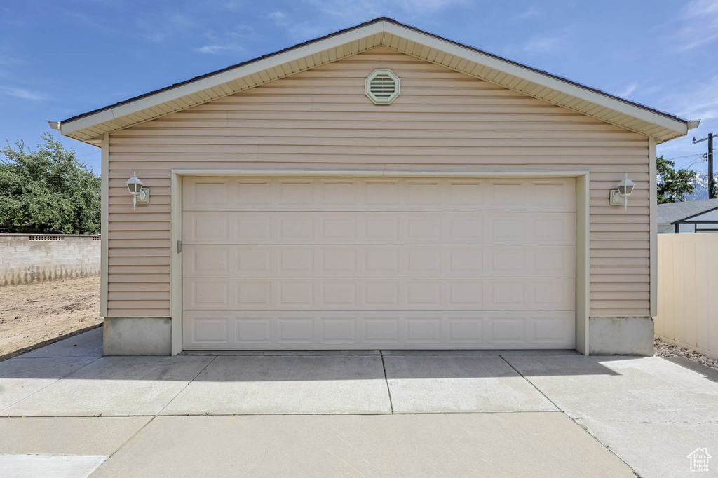 Detached garage with fence