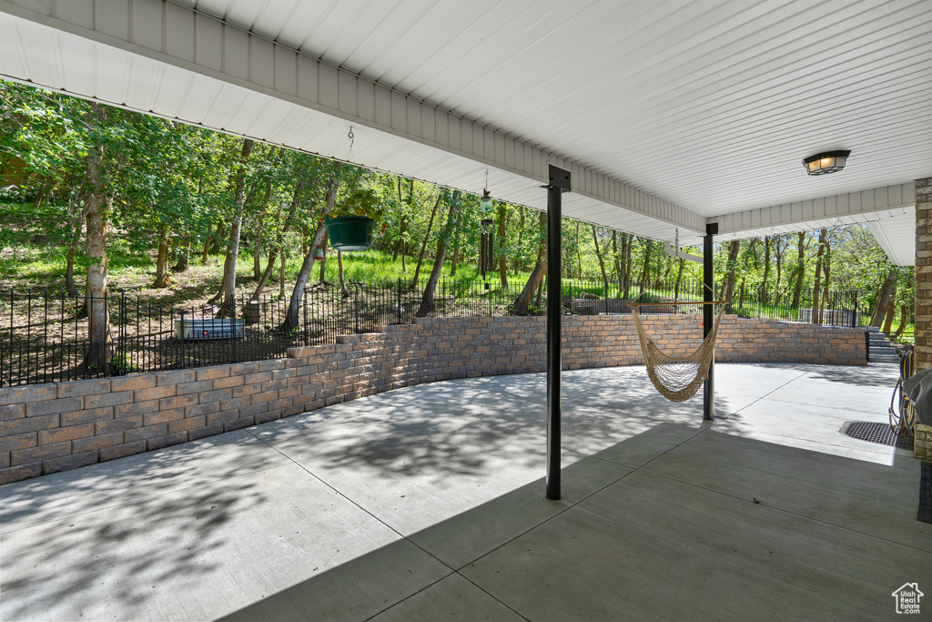 View of patio / terrace featuring fence