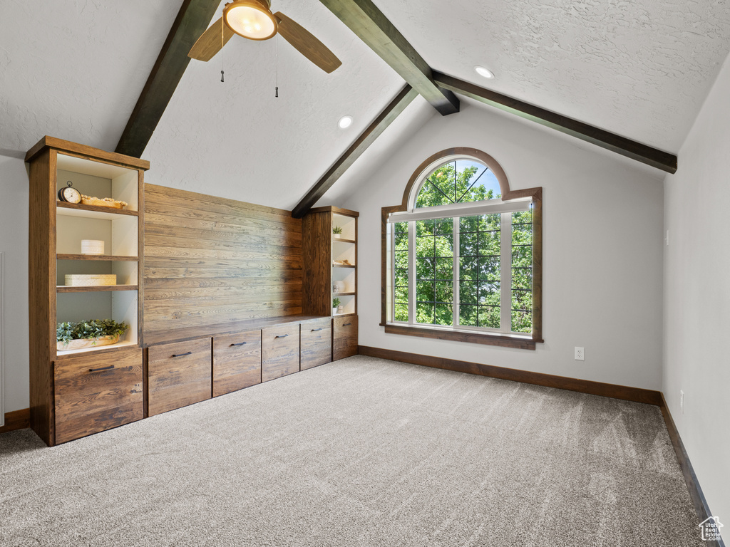 Unfurnished living room featuring carpet flooring, baseboards, a ceiling fan, recessed lighting, and a textured ceiling