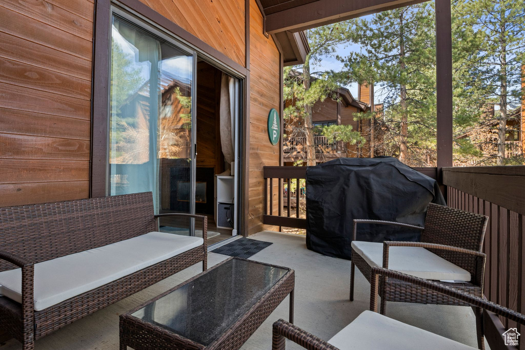 View of patio featuring a grill and outdoor lounge area