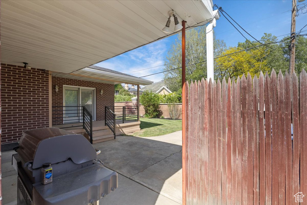 View of patio / terrace with fence and area for grilling