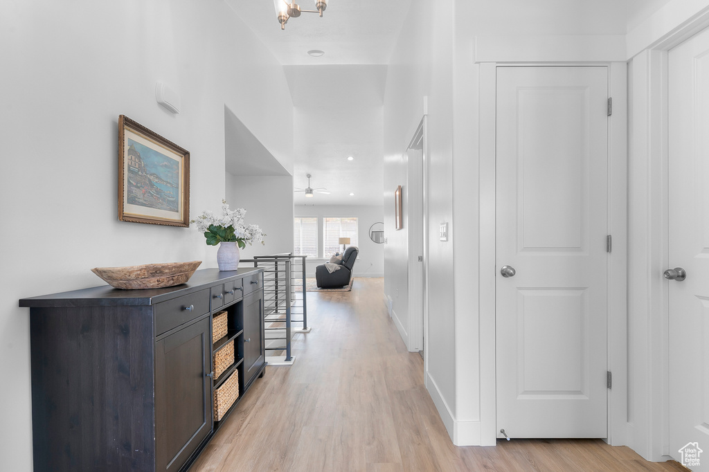 Corridor with light wood finished floors