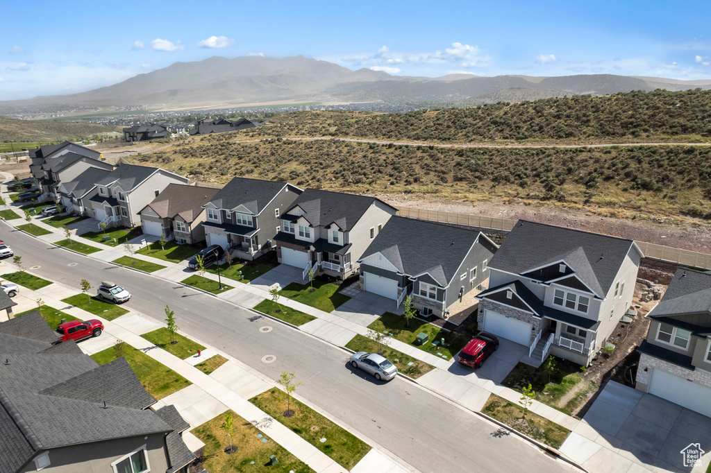Aerial perspective of suburban area featuring mountains