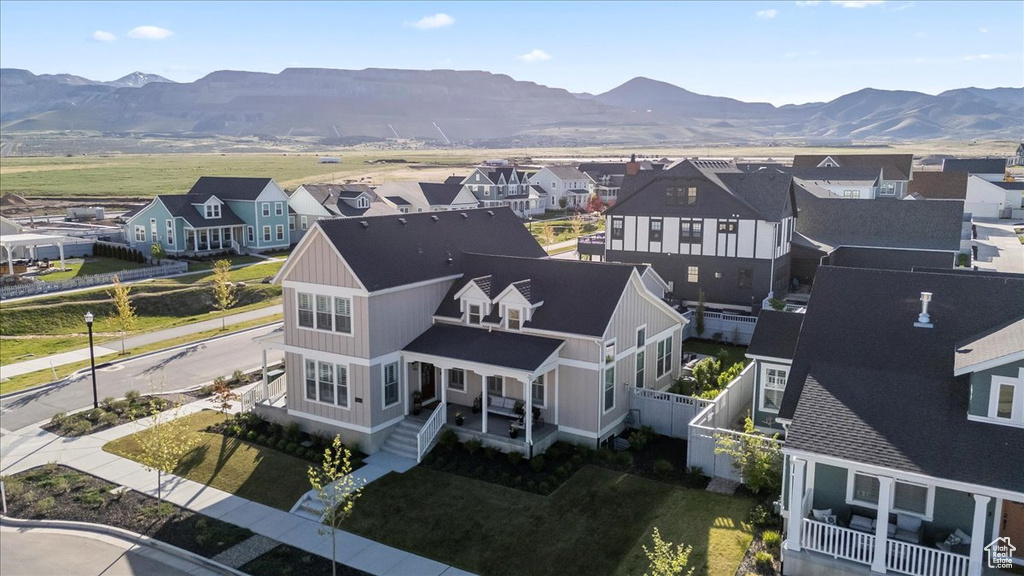 Aerial view of residential area with a mountain backdrop