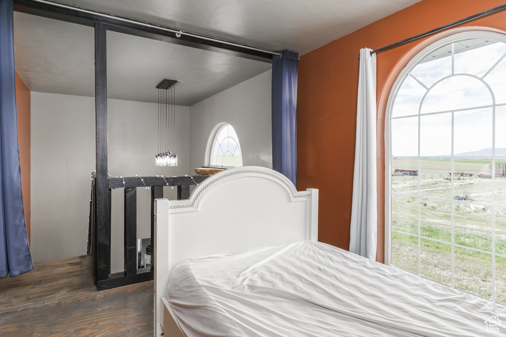Bedroom featuring wood finished floors