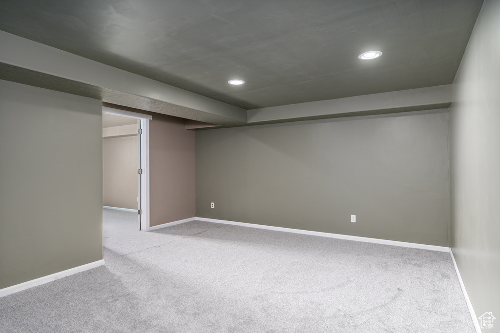 Finished basement with carpet, recessed lighting, and baseboards