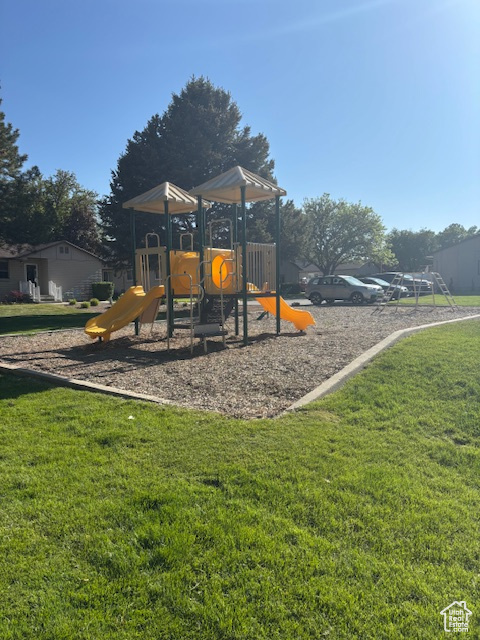 Communal playground featuring a yard