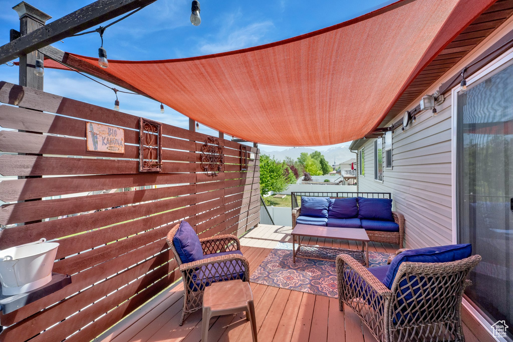Deck with an outdoor hangout area