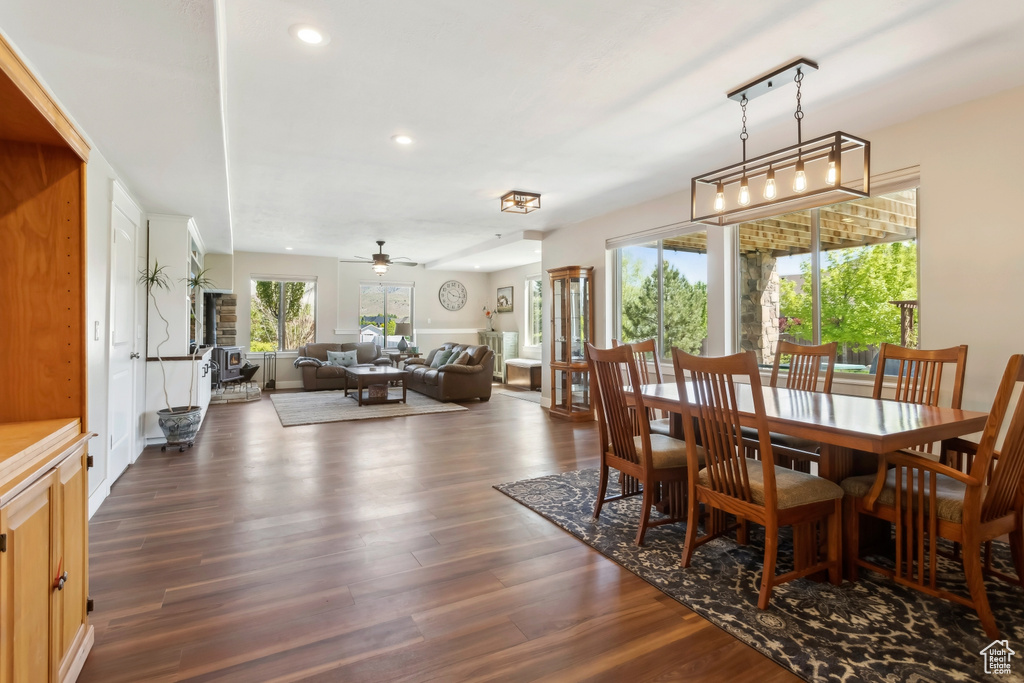Dining space featuring dark wood finished floors, recessed lighting, and ceiling fan