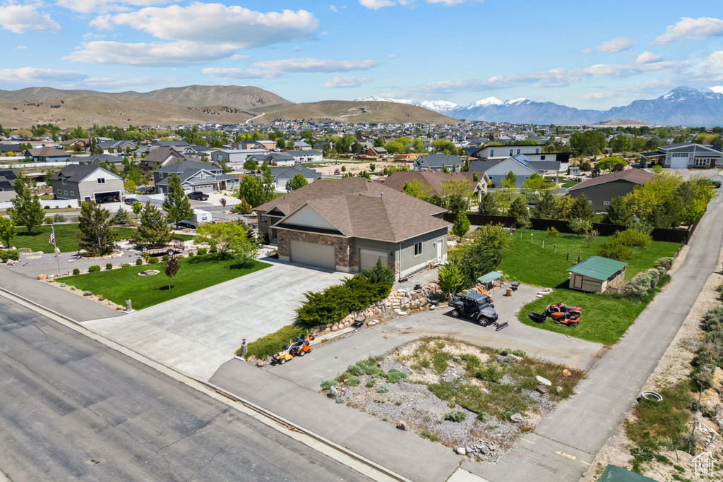 Aerial view of residential area with a mountain backdrop