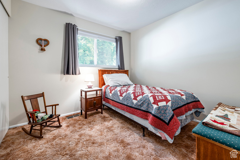 View of carpeted bedroom