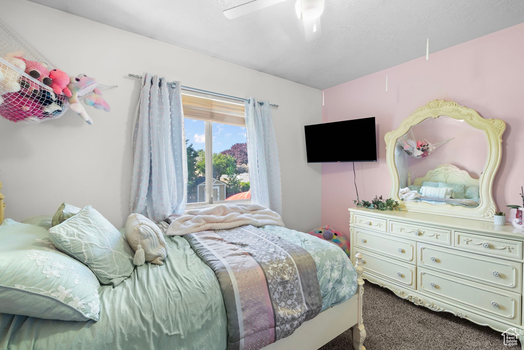 Bedroom with carpet floors and ceiling fan