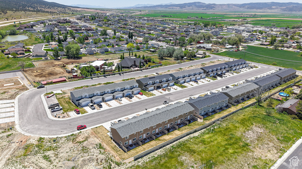 Aerial view of residential area with mountains