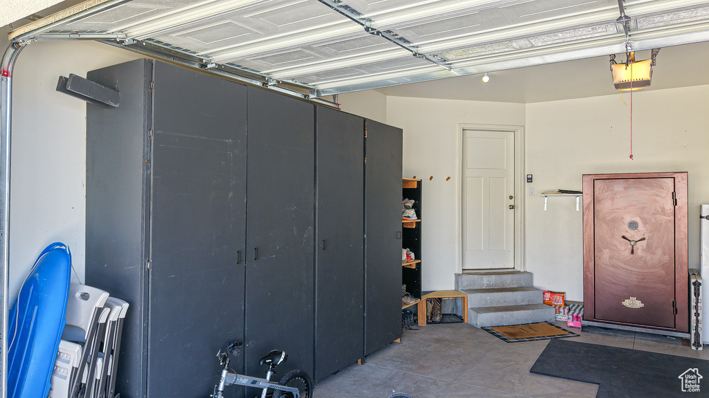 Garage featuring a garage door opener