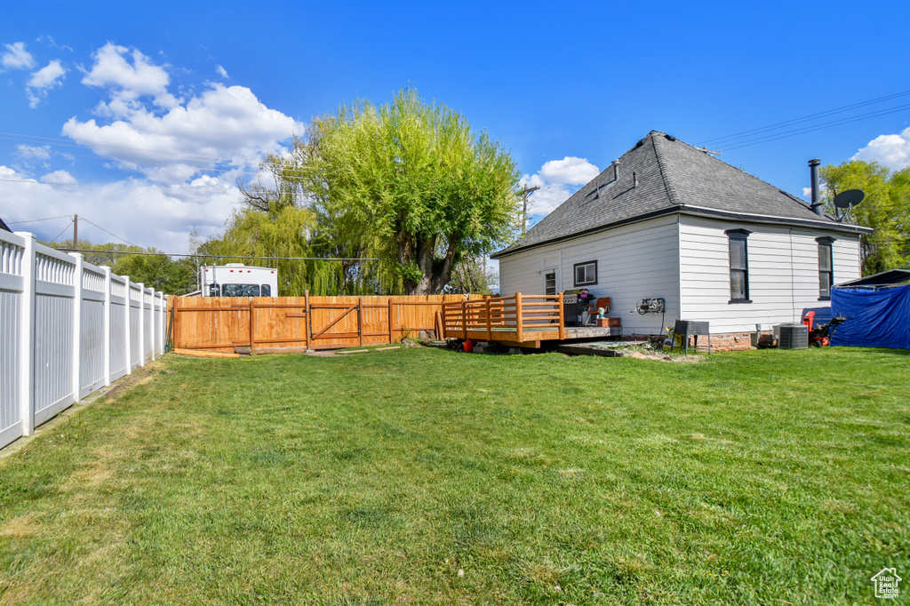 View of yard featuring a deck