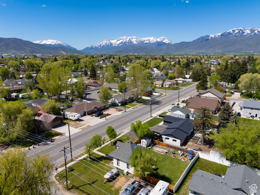 Aerial view of residential area with a mountain backdrop