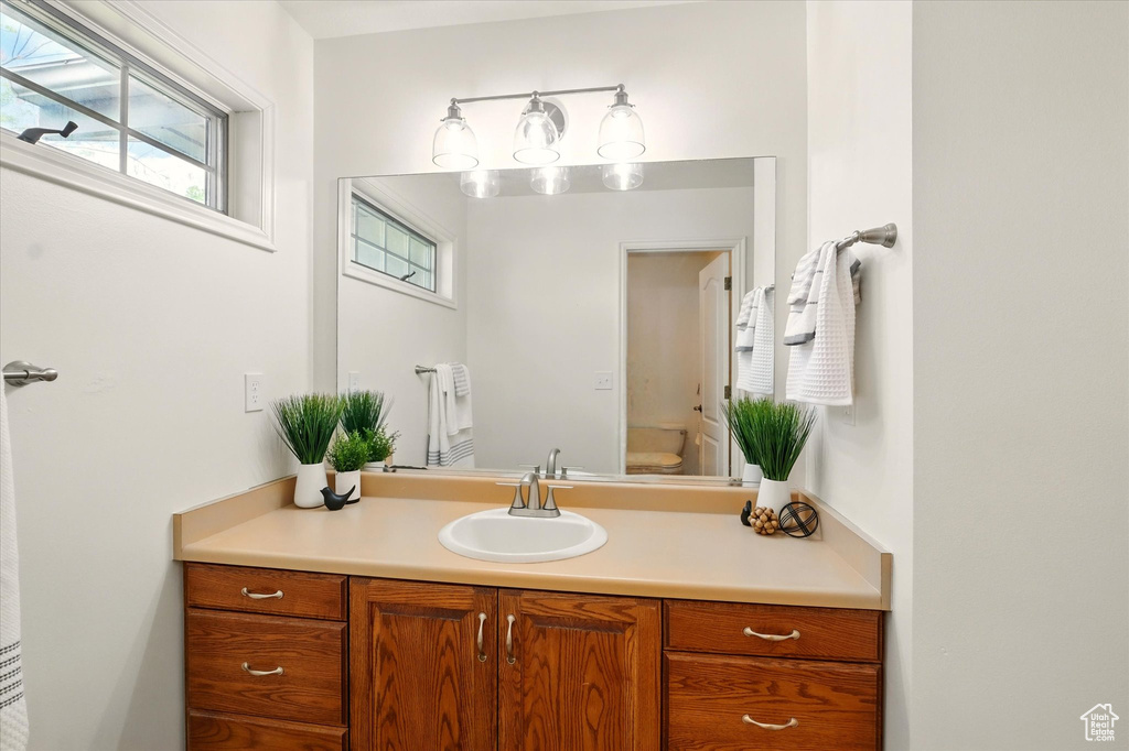 Bathroom with vanity and toilet