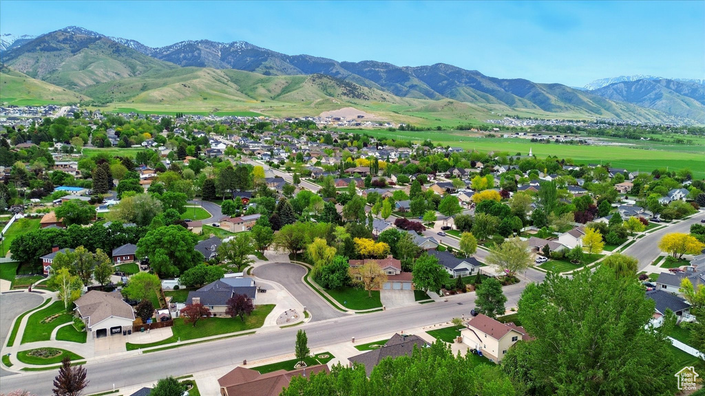 Aerial view of residential area with a mountainous background