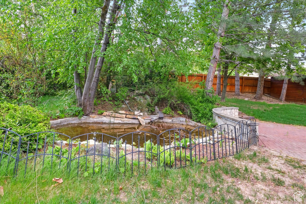View of yard featuring fence