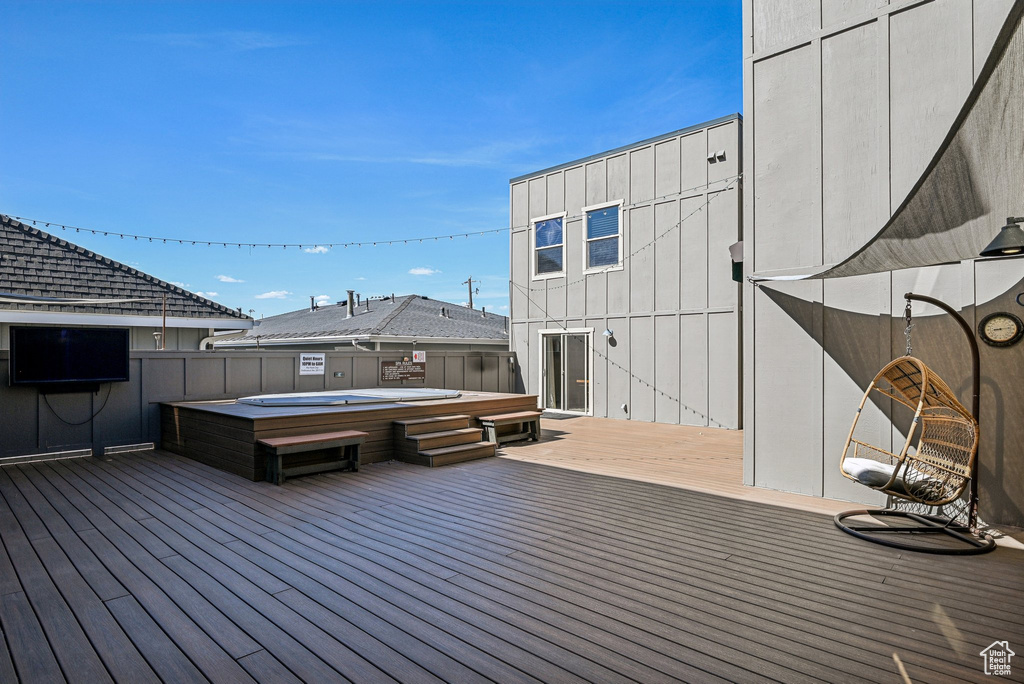 Deck featuring a hot tub