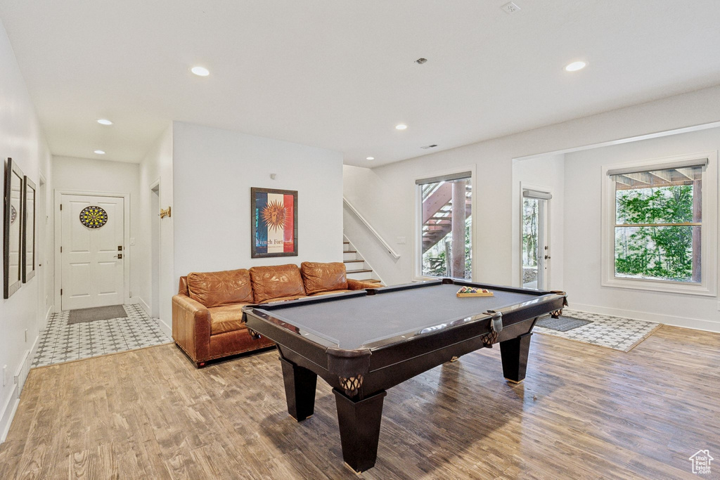 Recreation room featuring light wood-style floors, pool table, baseboards, and recessed lighting