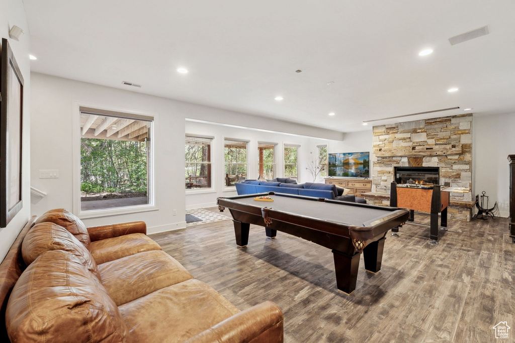 Recreation room with billiards, recessed lighting, wood finished floors, and healthy amount of natural light