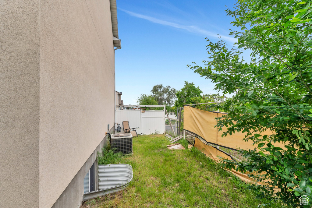 View of yard featuring cooling unit
