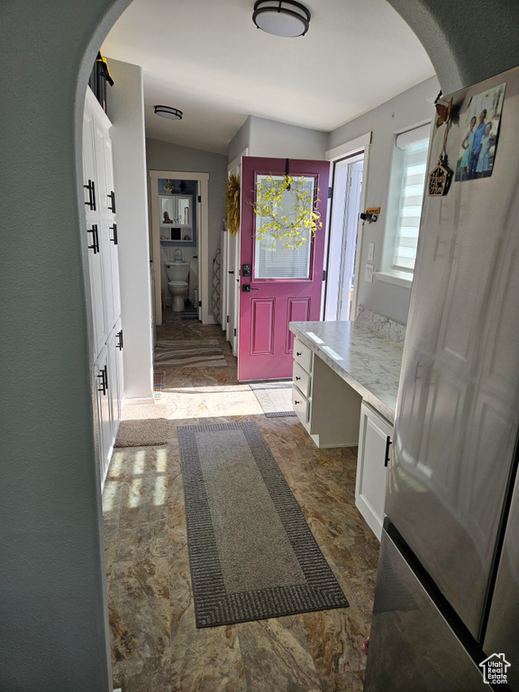 Mudroom with arched walkways